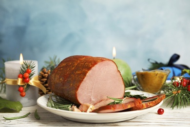 Delicious ham served on white wooden table. Christmas dinner