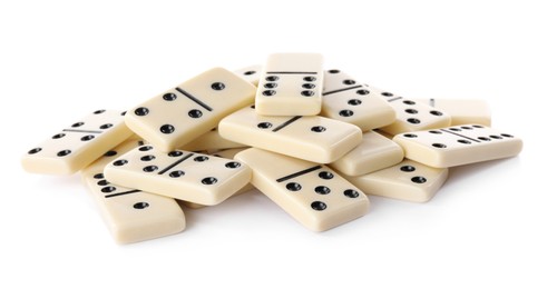 Pile of classic domino tiles on white background