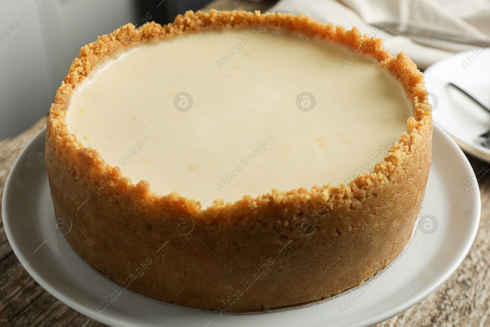 Photo of Tasty vegan tofu cheesecake on table, closeup