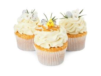 Photo of Tasty Easter cupcakes with vanilla cream isolated on white