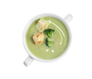 Photo of Delicious broccoli cream soup with croutons isolated on white, top view