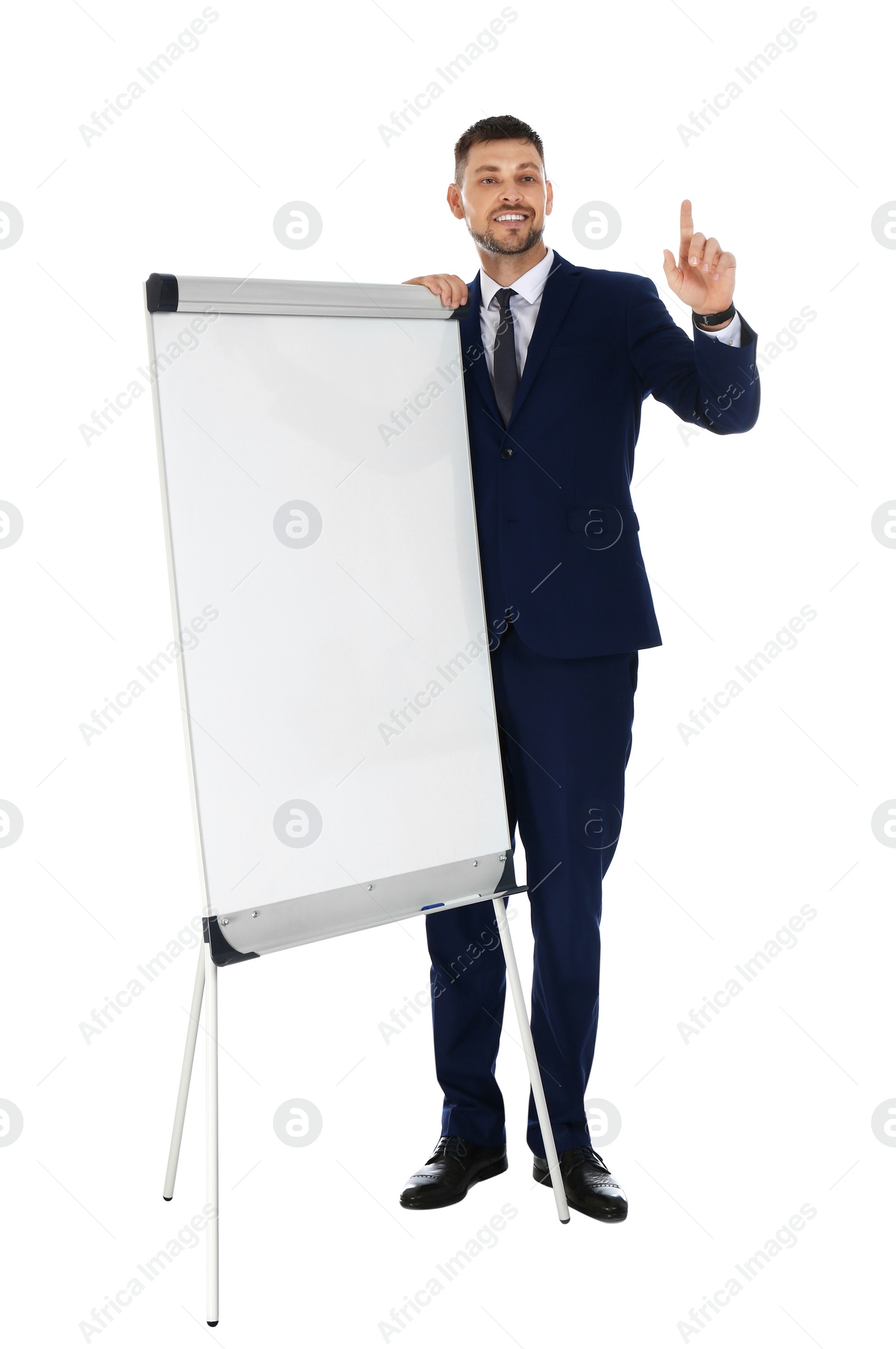 Photo of Professional business trainer near flip chart board on white background. Space for text