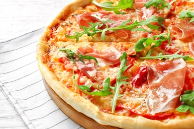 Tasty hot pizza with meat on table, closeup