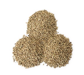 Photo of Piles of hemp seeds on white background, top view