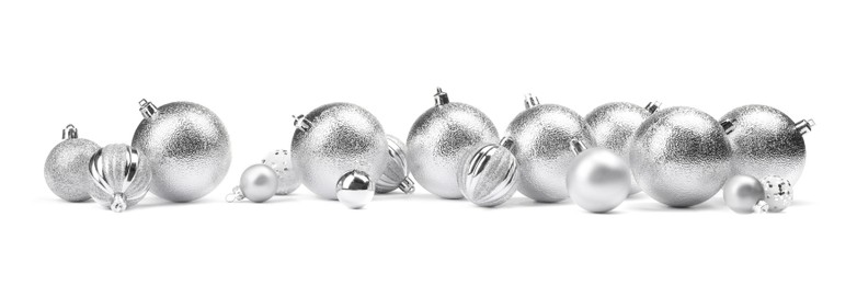 Many silver Christmas balls isolated on white