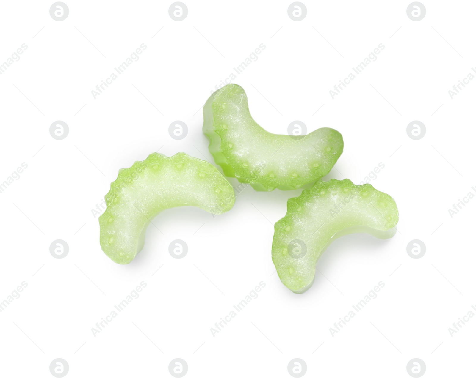 Photo of Fresh cut celery isolated on white, top view
