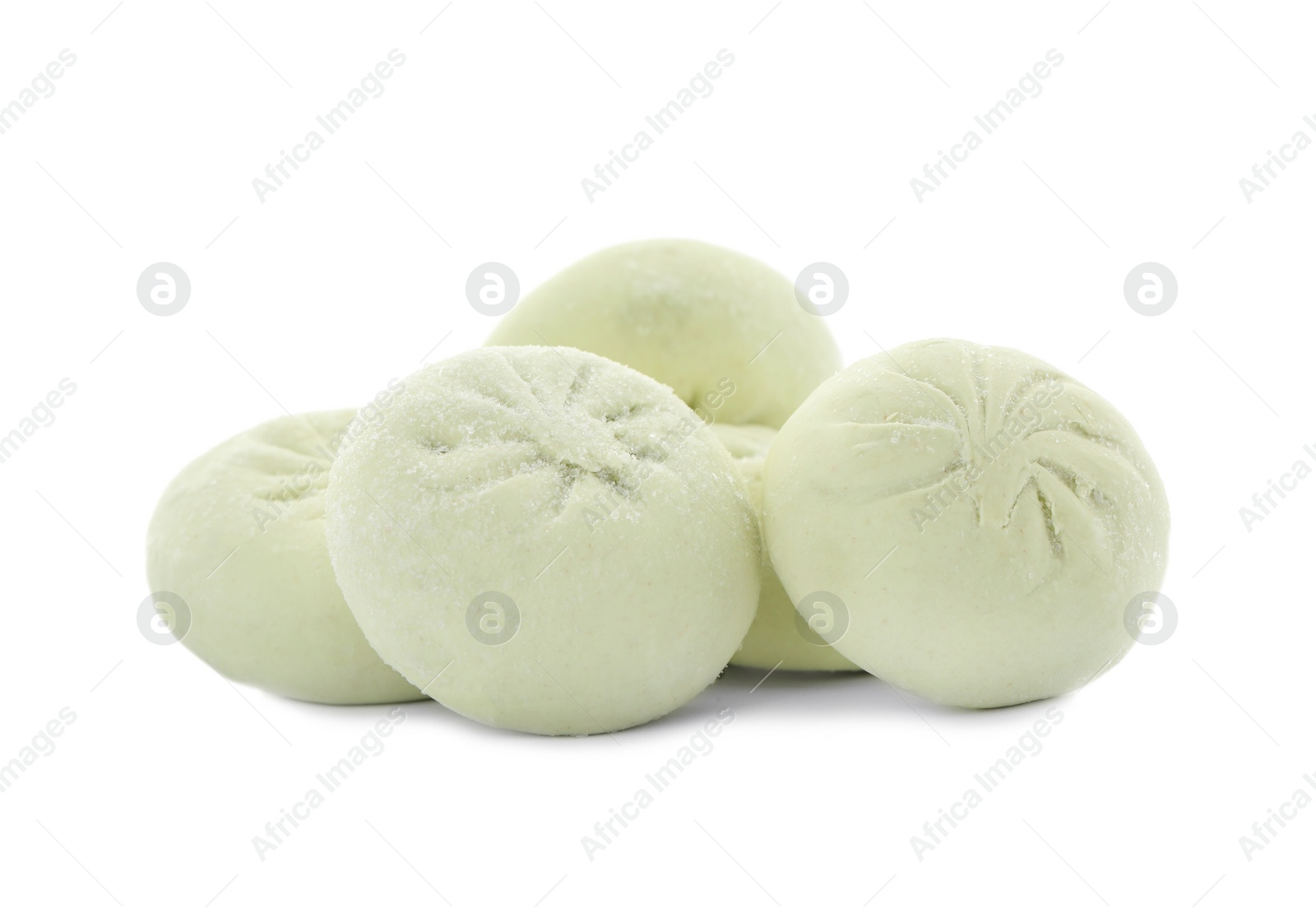 Photo of Heap of raw dumplings with tasty filling on white background