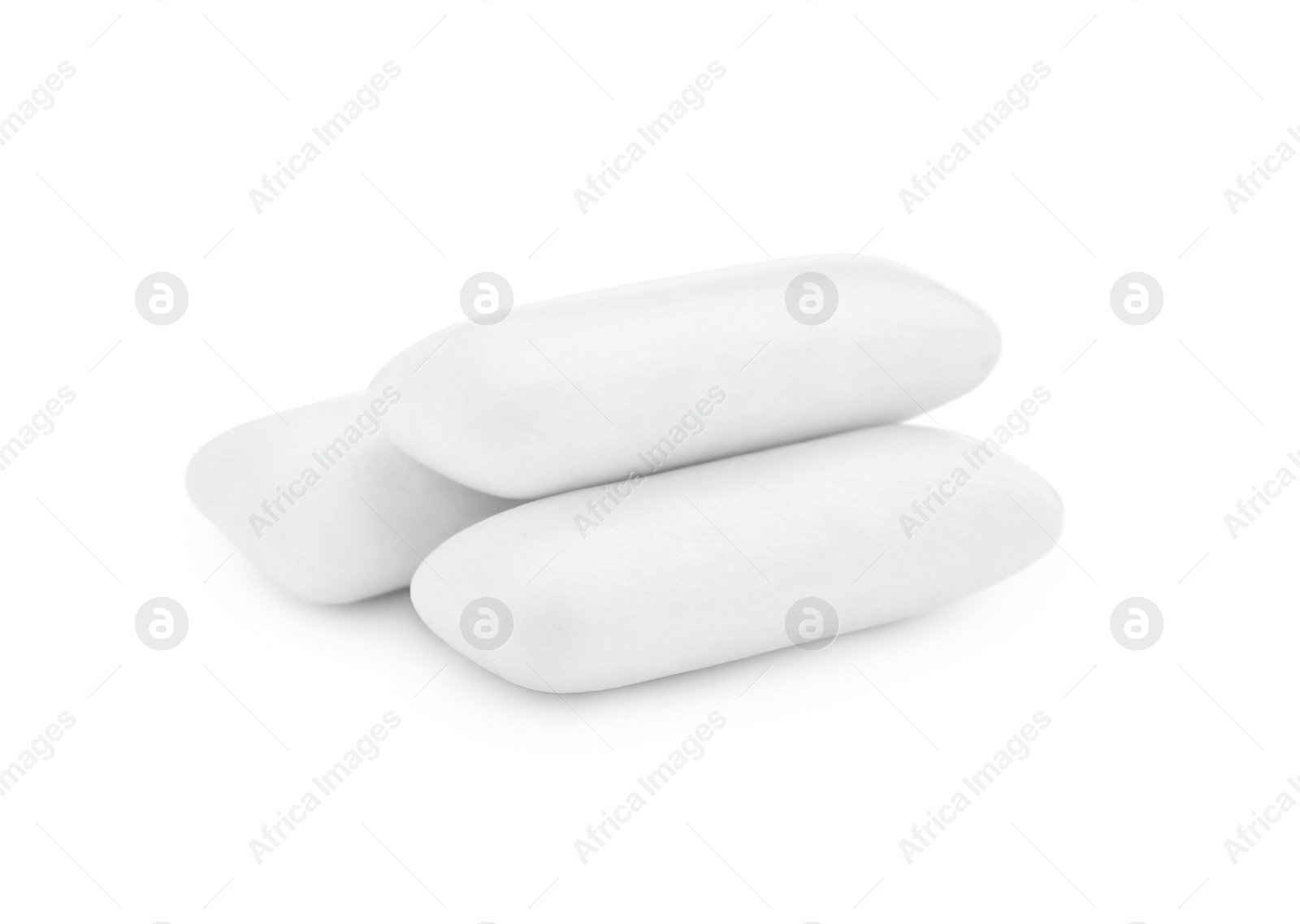 Photo of Three chewing gum pieces on white background