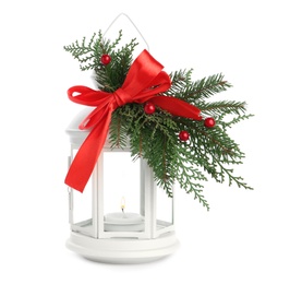 Photo of Decorative Christmas lantern with bow and coniferous twigs isolated on white