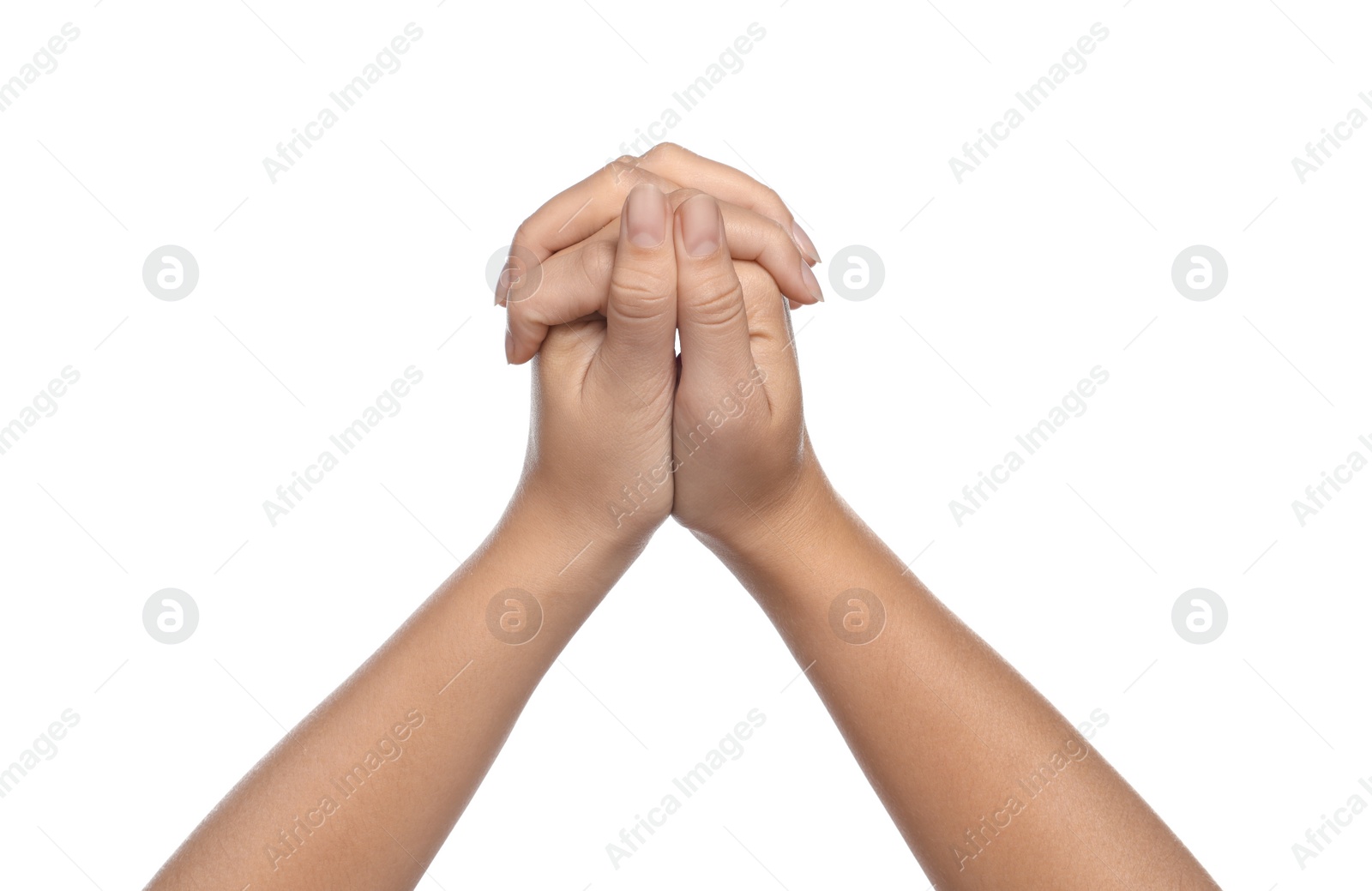 Photo of Woman holding hands clasped while praying on white background, closeup