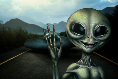 Alien and flying saucer on asphalt highway outdoors. Extraterrestrial visitors