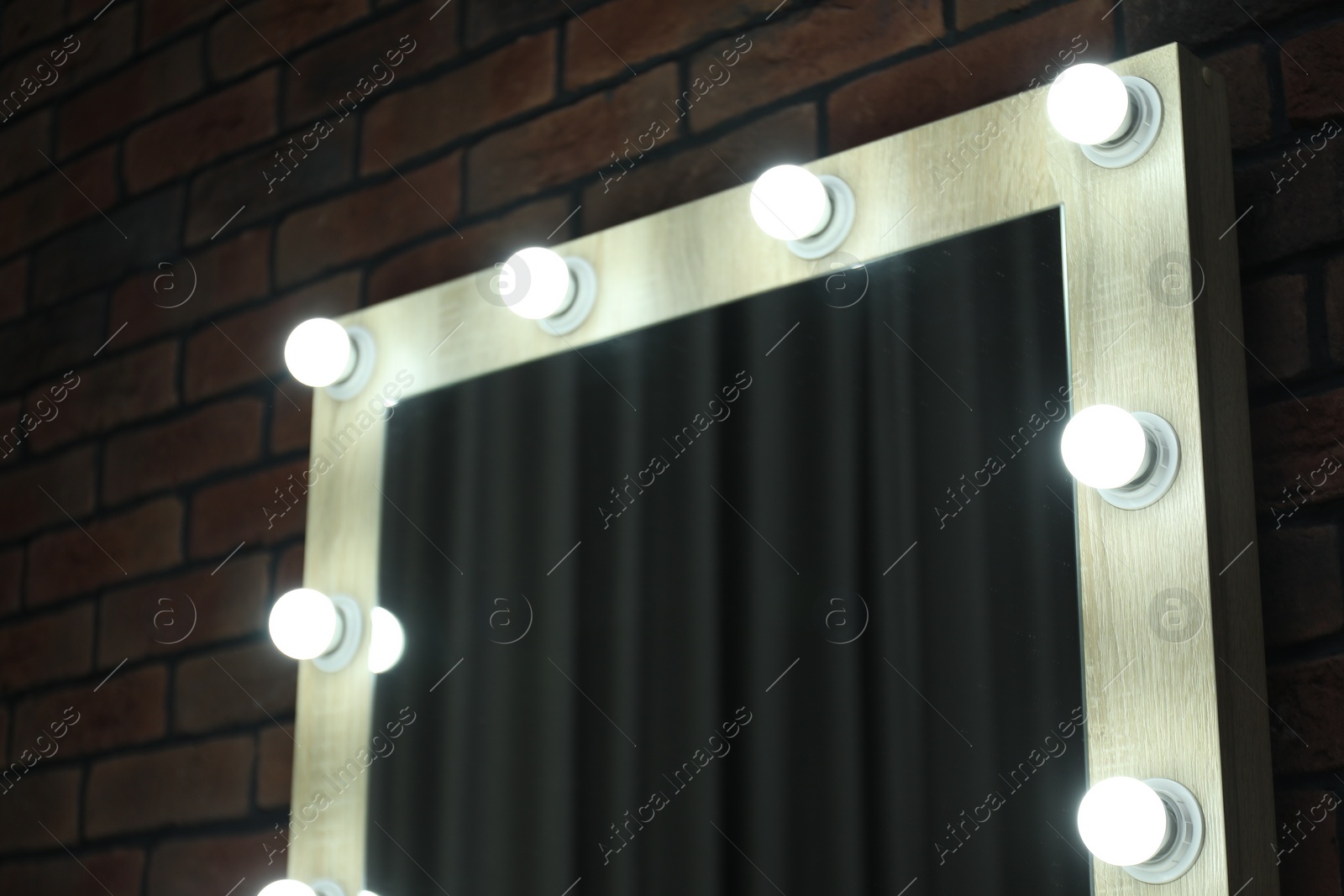 Photo of Mirror with light bulbs in makeup room