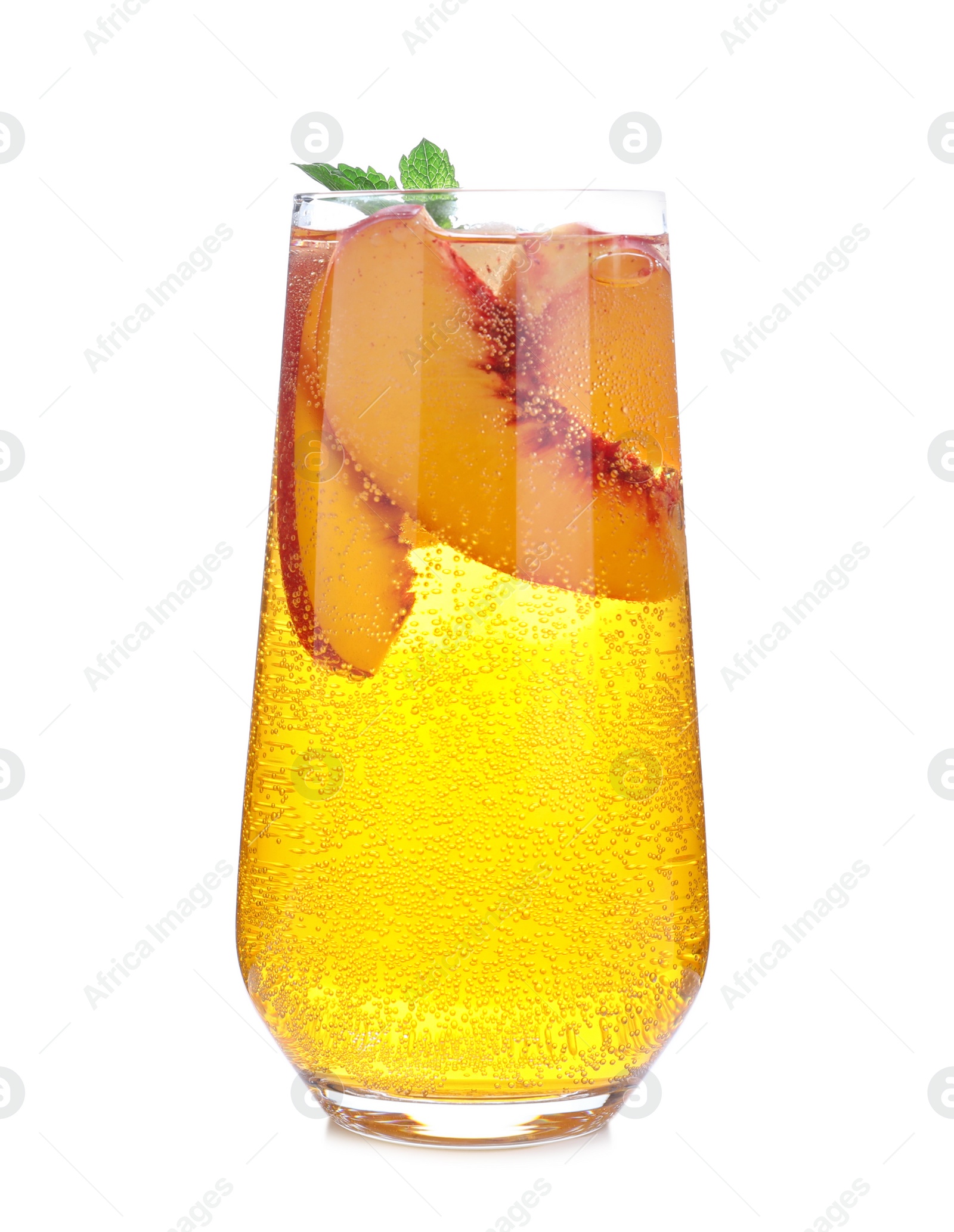 Photo of Delicious peach lemonade made with soda water isolated on white