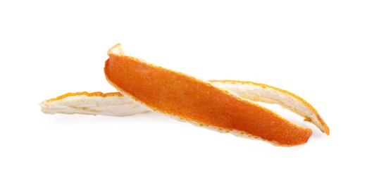 Photo of Dry orange fruit peels on white background