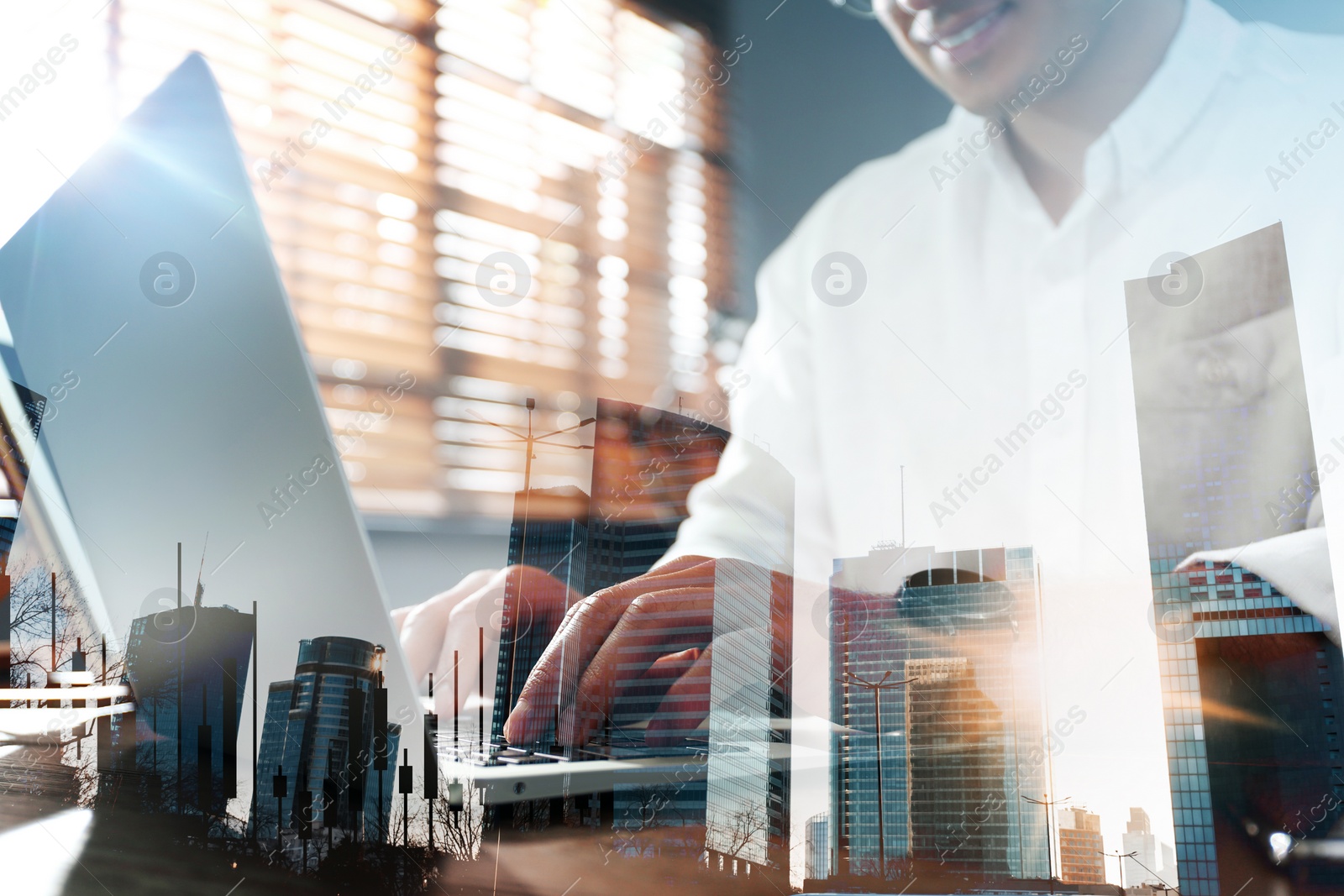 Image of Innovation concept. Double exposure of man working on laptop and cityscape