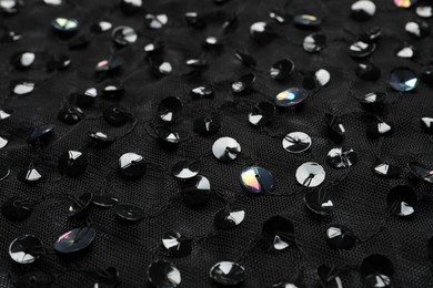 Photo of Beautiful black sequin fabric as background, closeup
