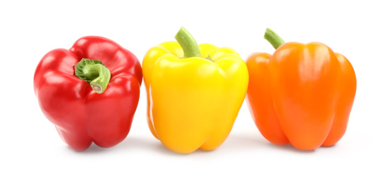 Photo of Fresh ripe bell peppers on white background