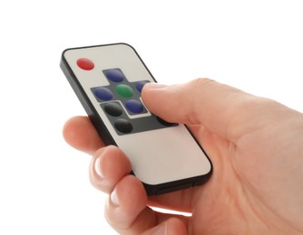 Woman holding remote control on white background, closeup