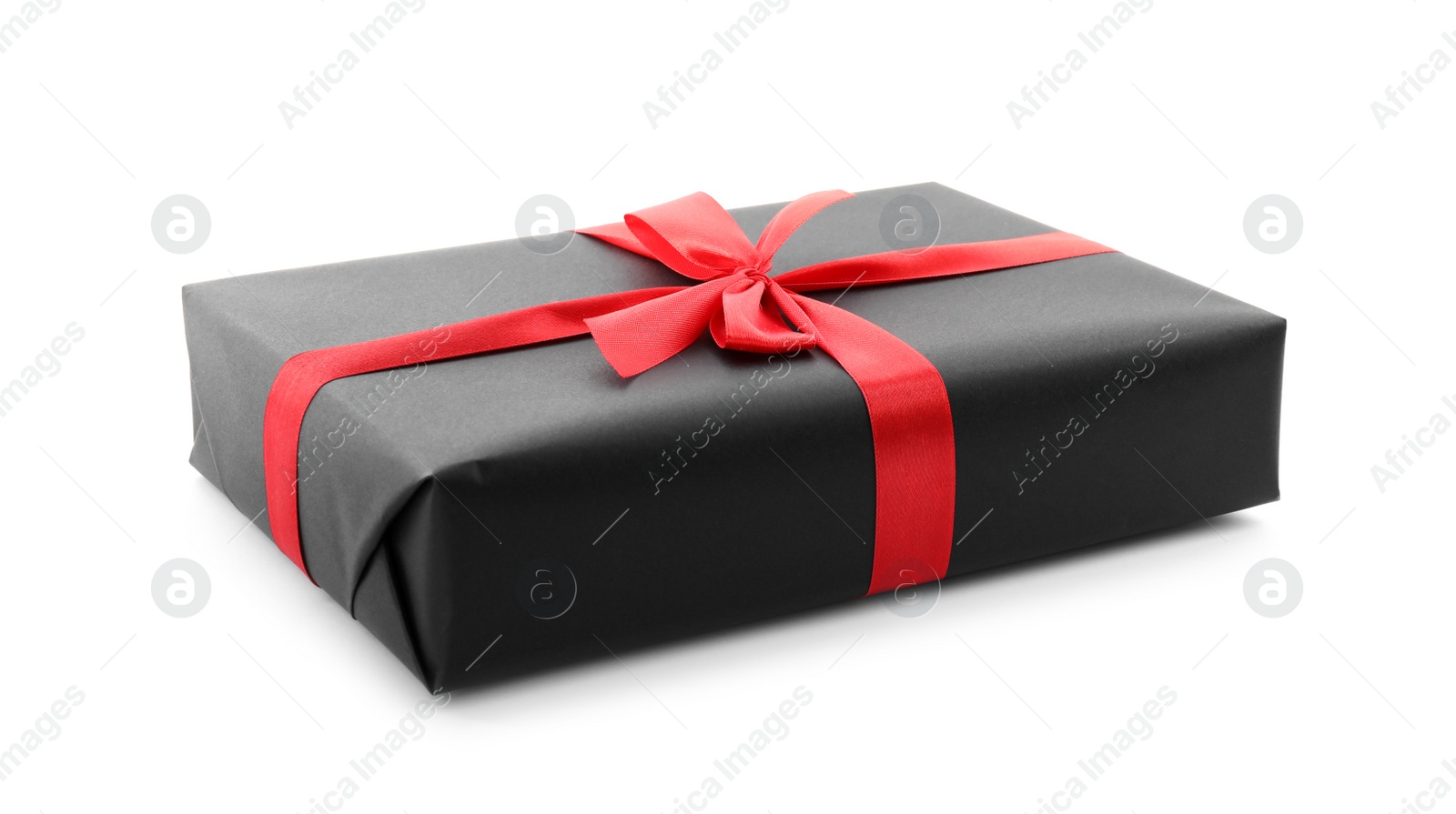 Photo of Black gift box with bow isolated on white