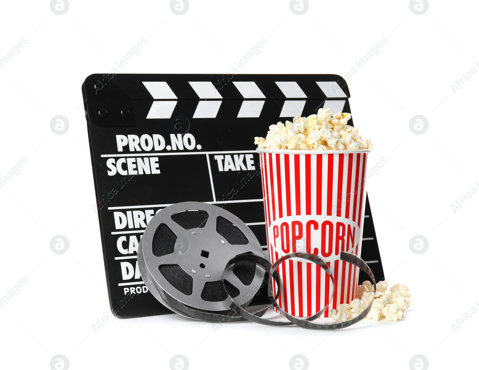 Photo of Popcorn, clapper and reel isolated on white. Cinema snack