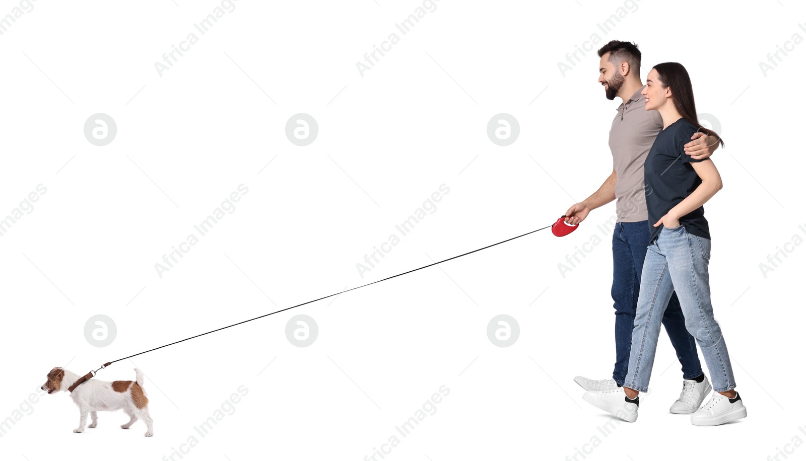 Image of Happy couple walking with dog on white background