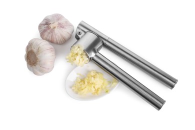 One metal press and garlic isolated on white, top view
