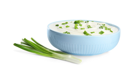 Photo of Fresh sour cream with onion on white background