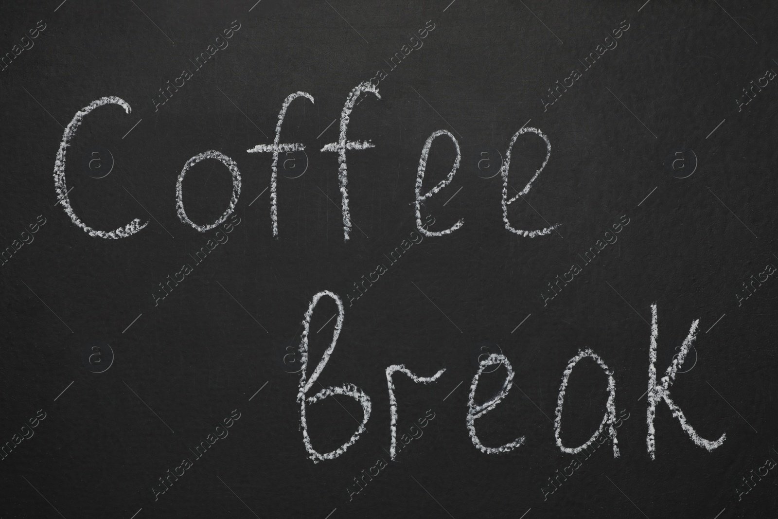 Photo of Phrase Coffee Break written with chalk on blackboard