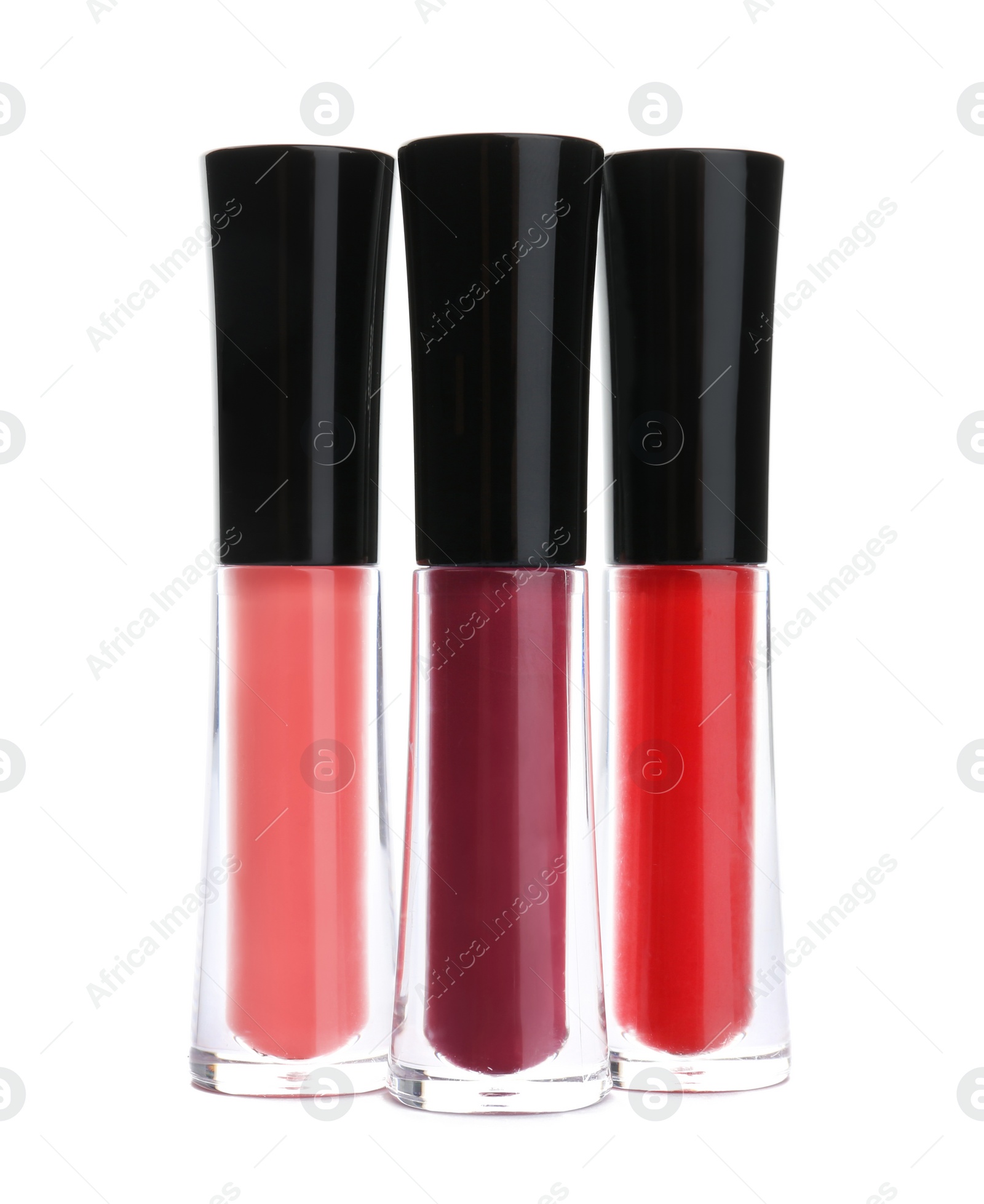 Photo of Lip glosses on white background