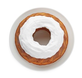 Photo of Homemade yogurt cake with cream on white background, top view