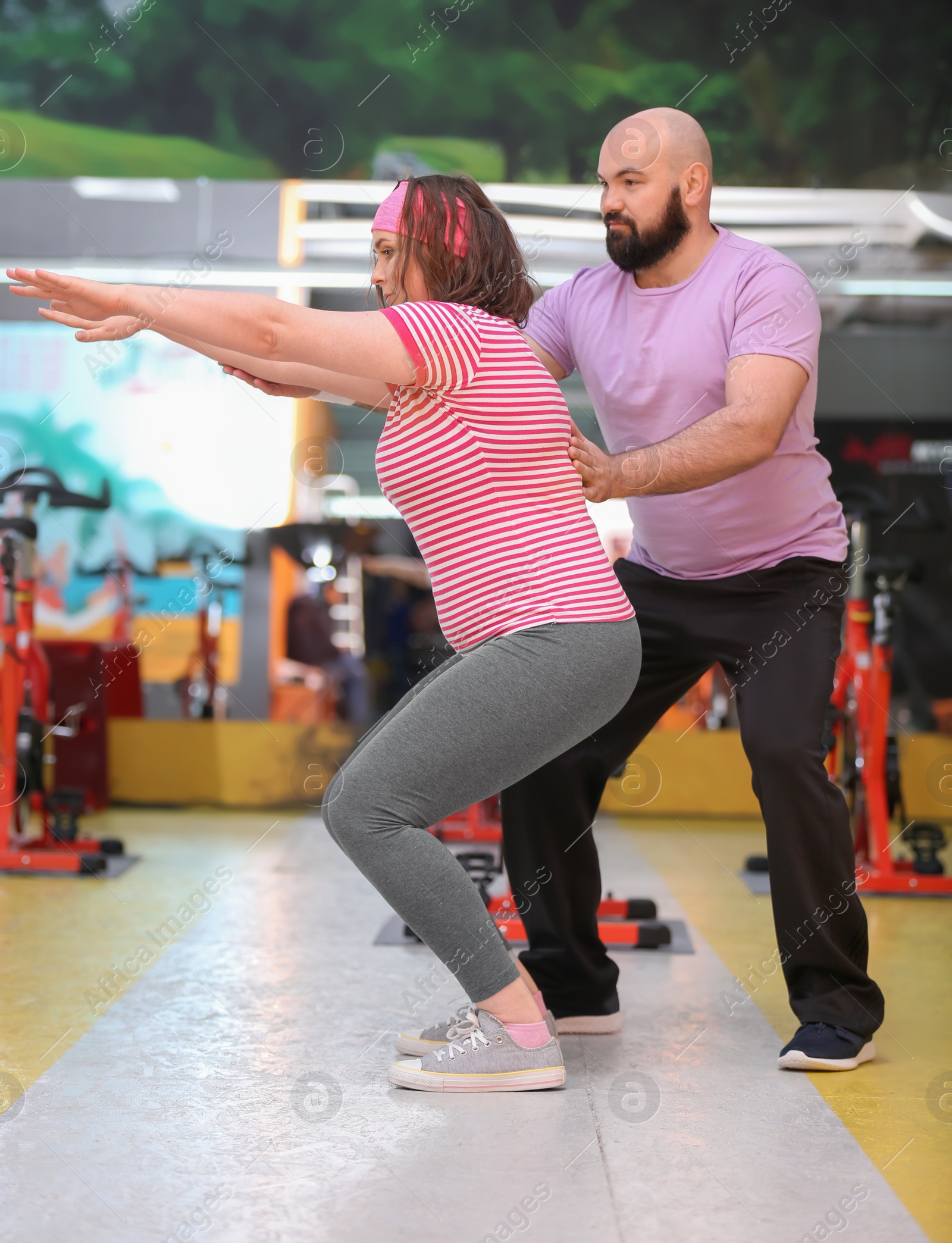 Photo of Overweight couple together in gym