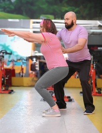 Photo of Overweight couple together in gym