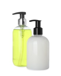 Dispensers of liquid soap on white background