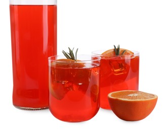 Photo of Aperol spritz cocktail, orange slices and rosemary in glasses isolated on white