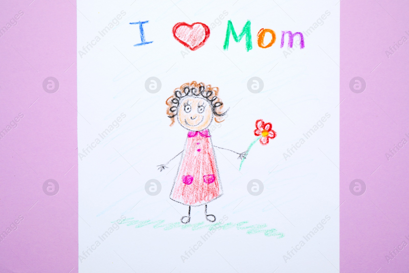 Photo of Drawing for Mother's day on lilac background, top view