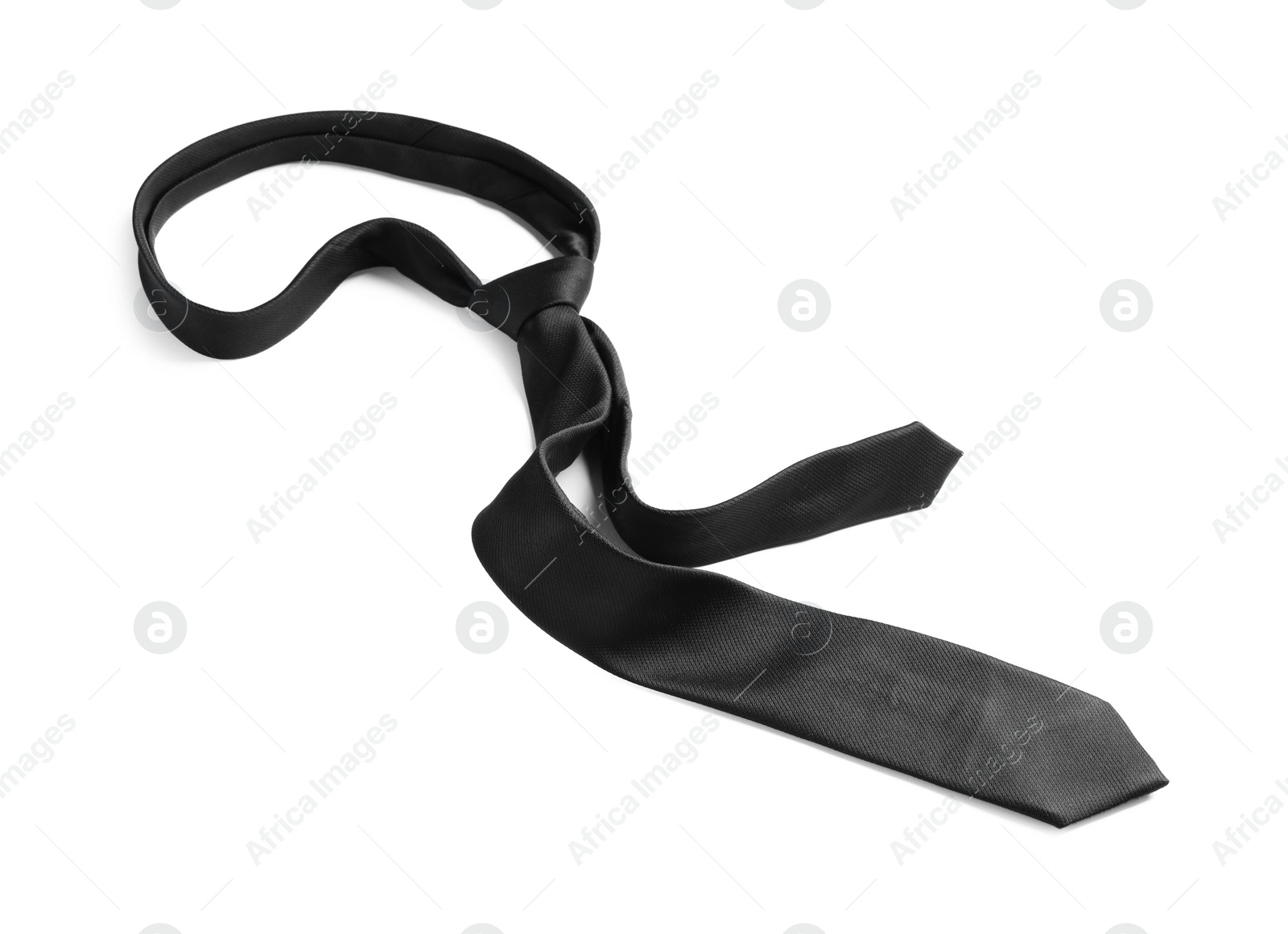 Photo of One black necktie isolated on white. Men's accessory