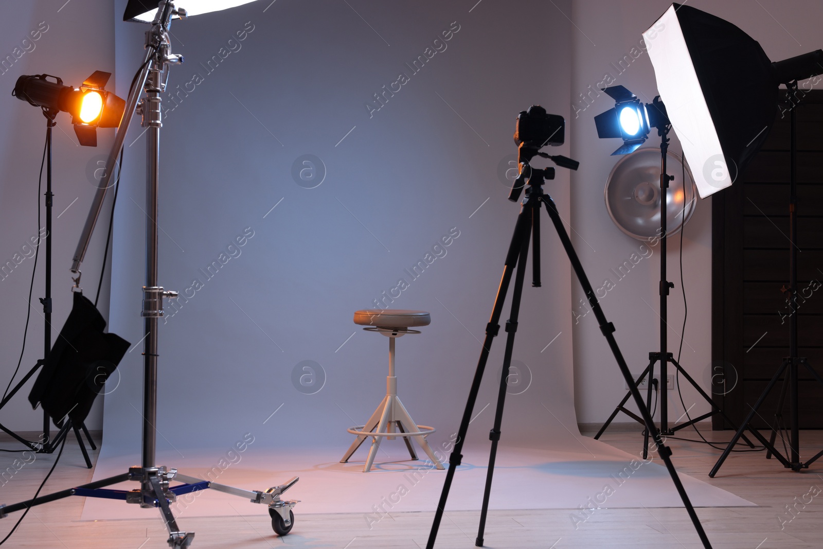 Photo of Casting call. Chair and different equipment in modern studio