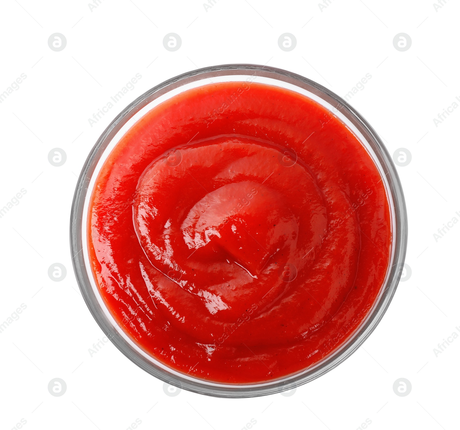 Photo of Tasty tomato sauce in glass bowl isolated on white, top view