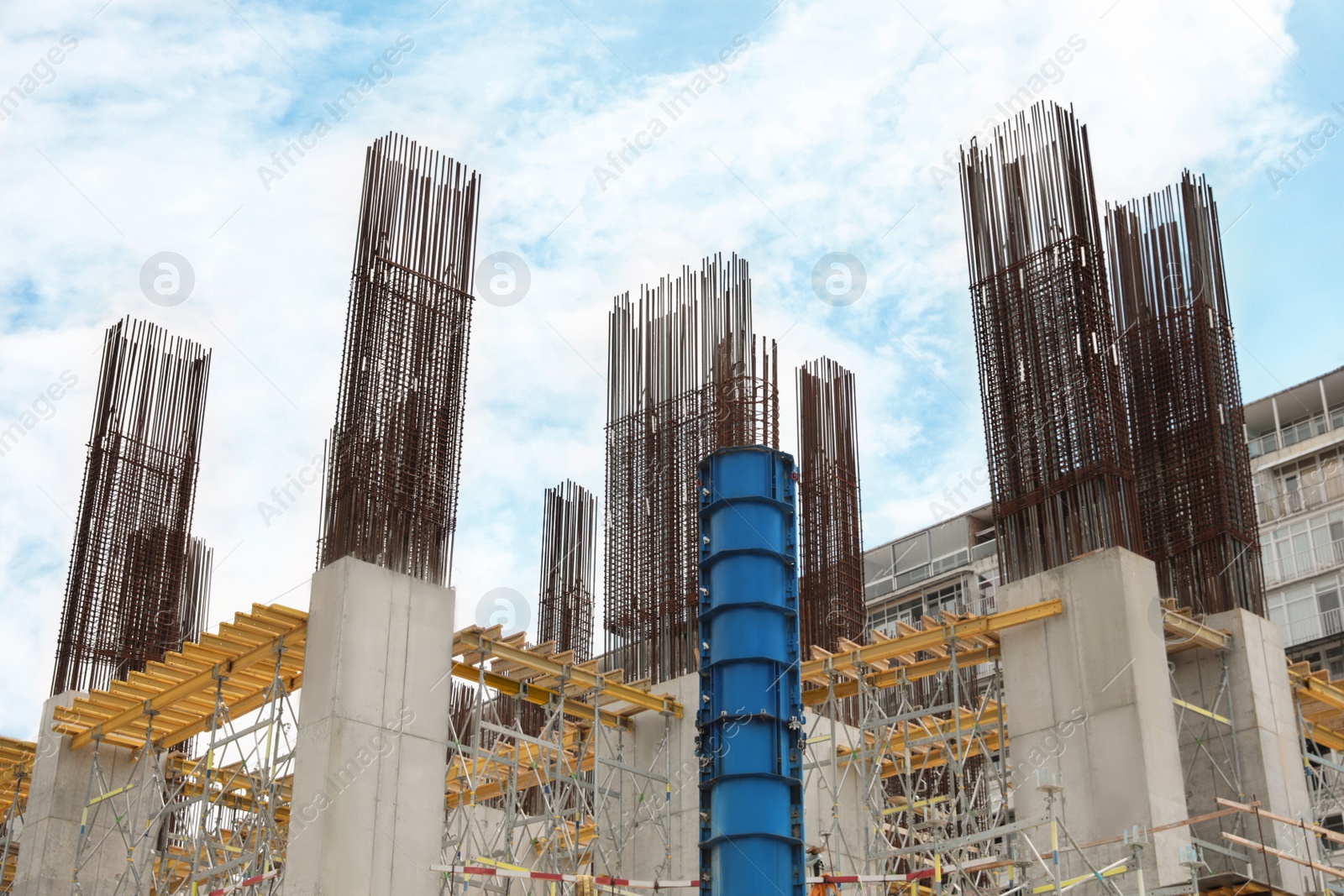 Photo of Unfinished building on construction site, low angle view