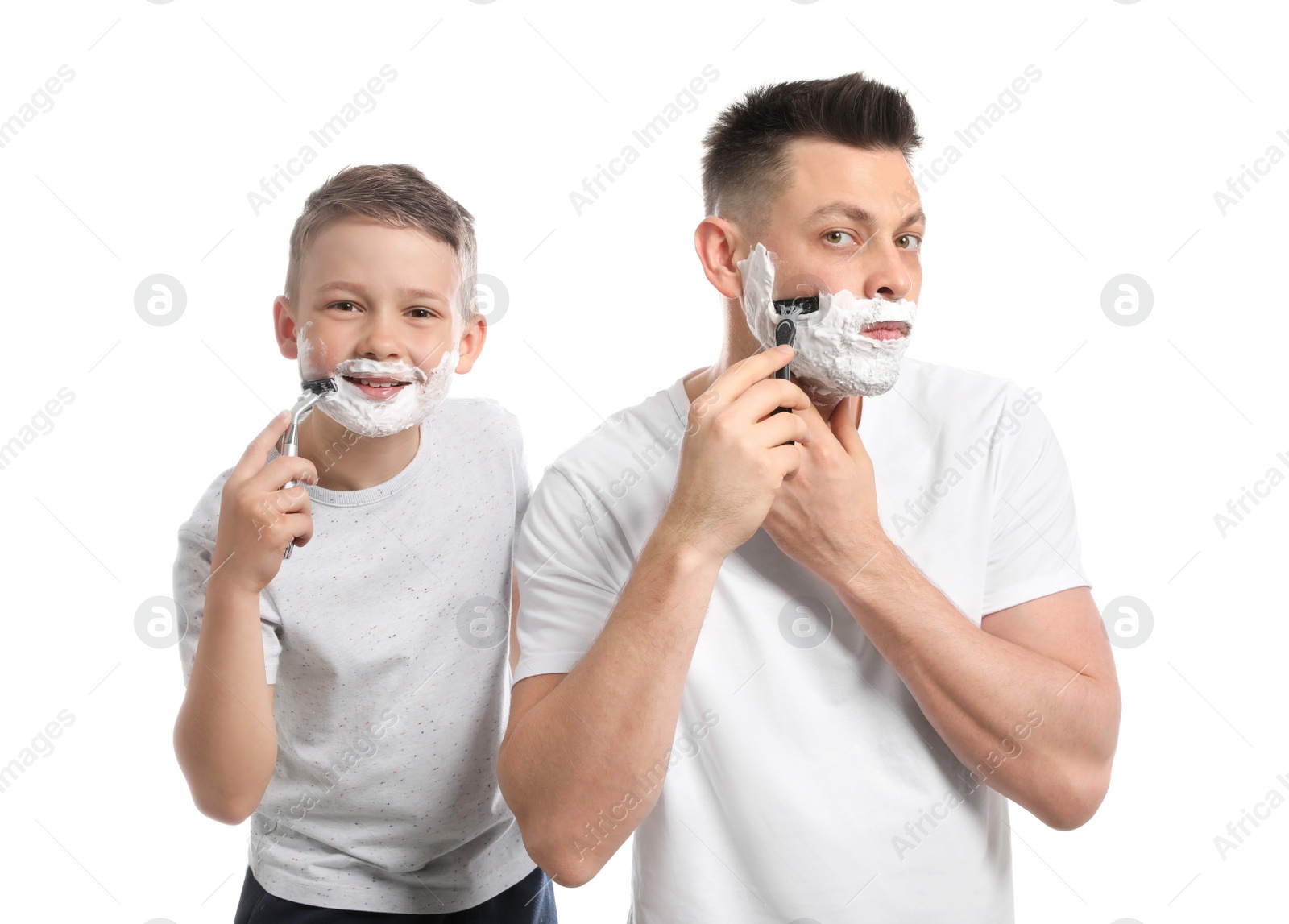 Photo of Dad shaving and son imitating him on white background