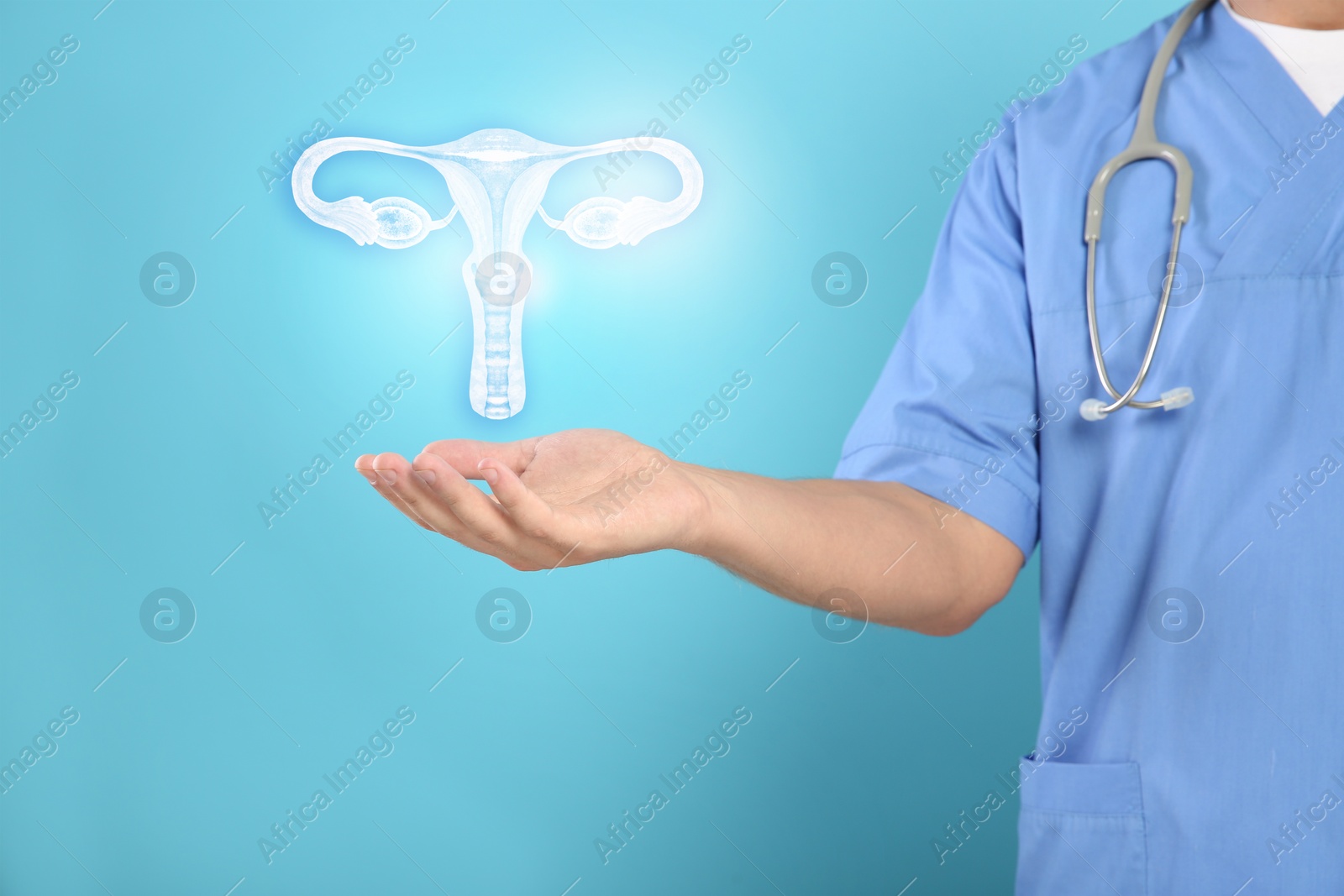 Image of Doctor and illustration of female reproductive system on light blue background, closeup