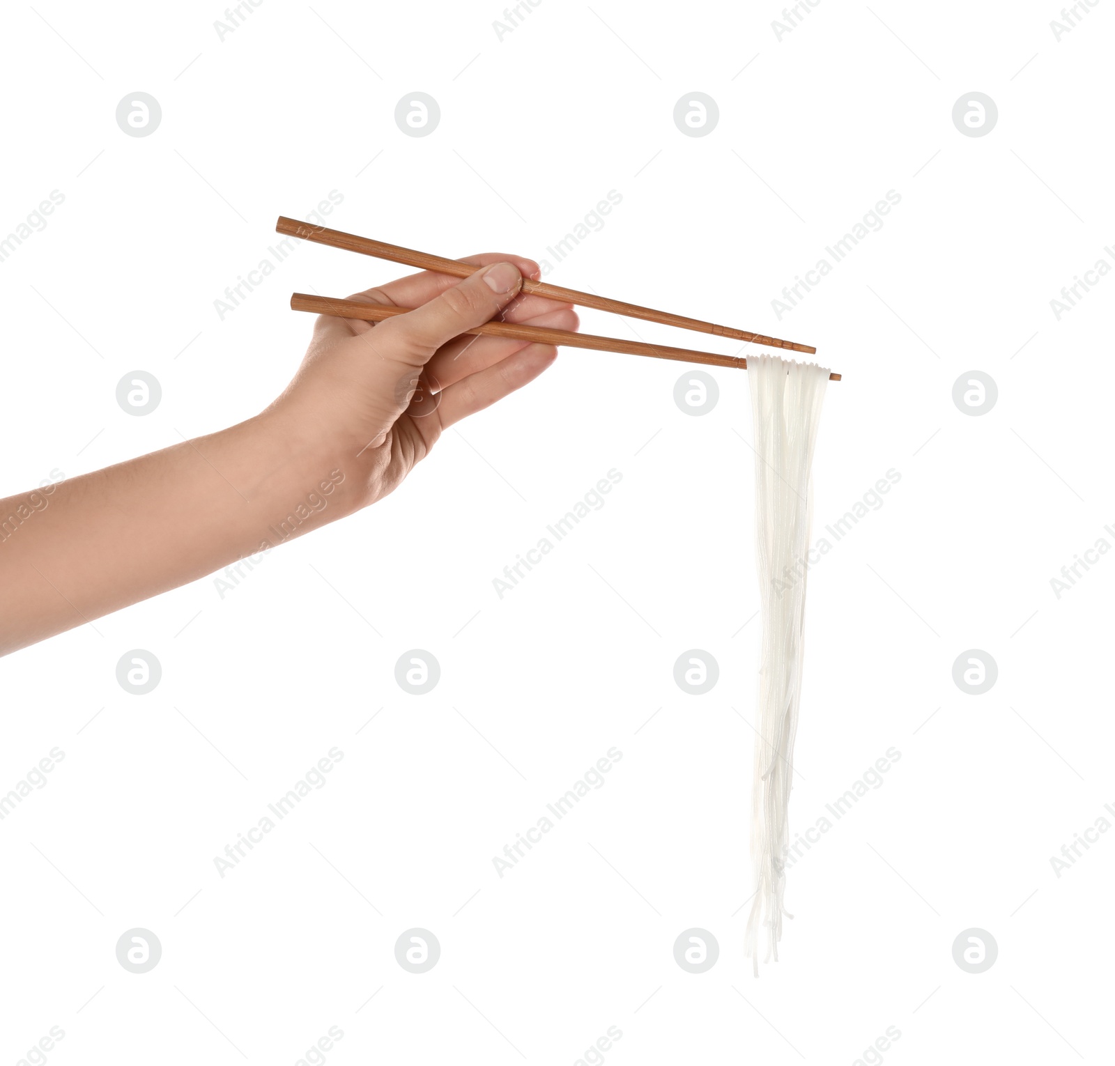 Photo of Woman holding cooked rice noodles with chopsticks on white background, closeup