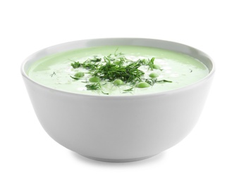 Photo of Green pea soup in bowl on white background