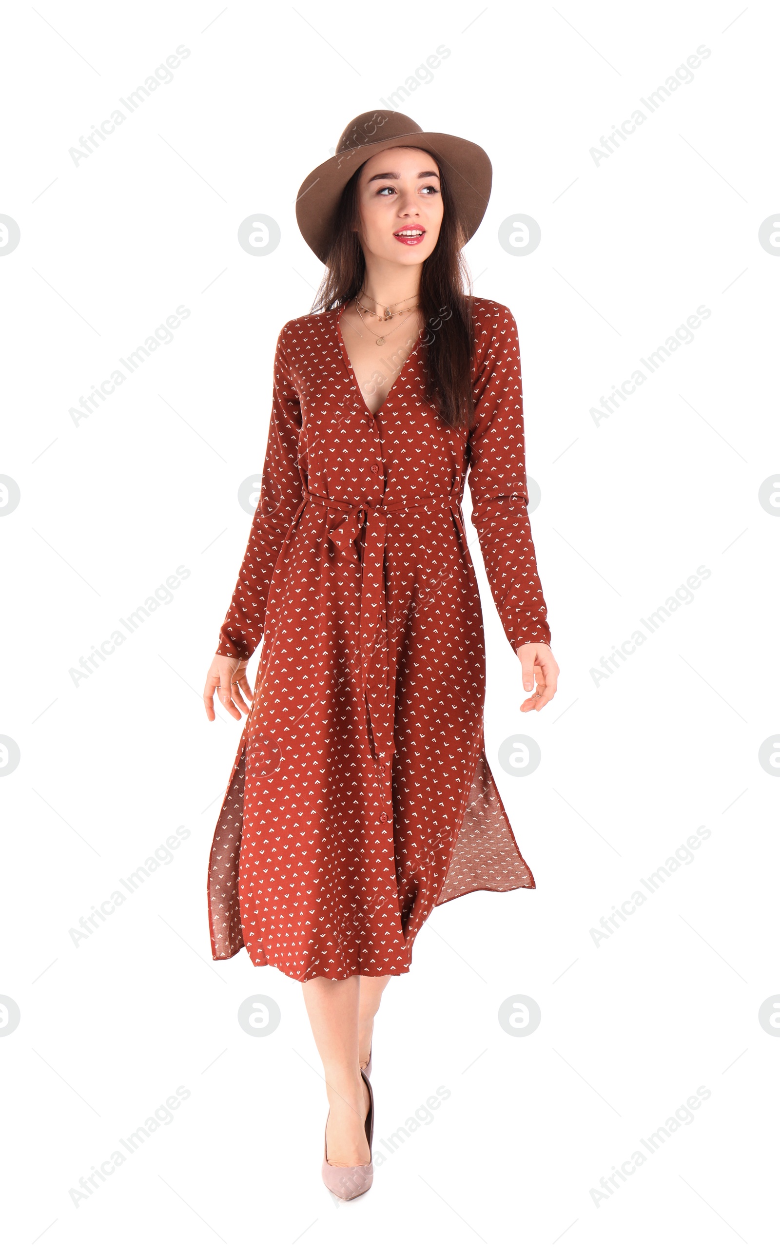 Photo of Portrait of beautiful young woman in stylish dress on white background