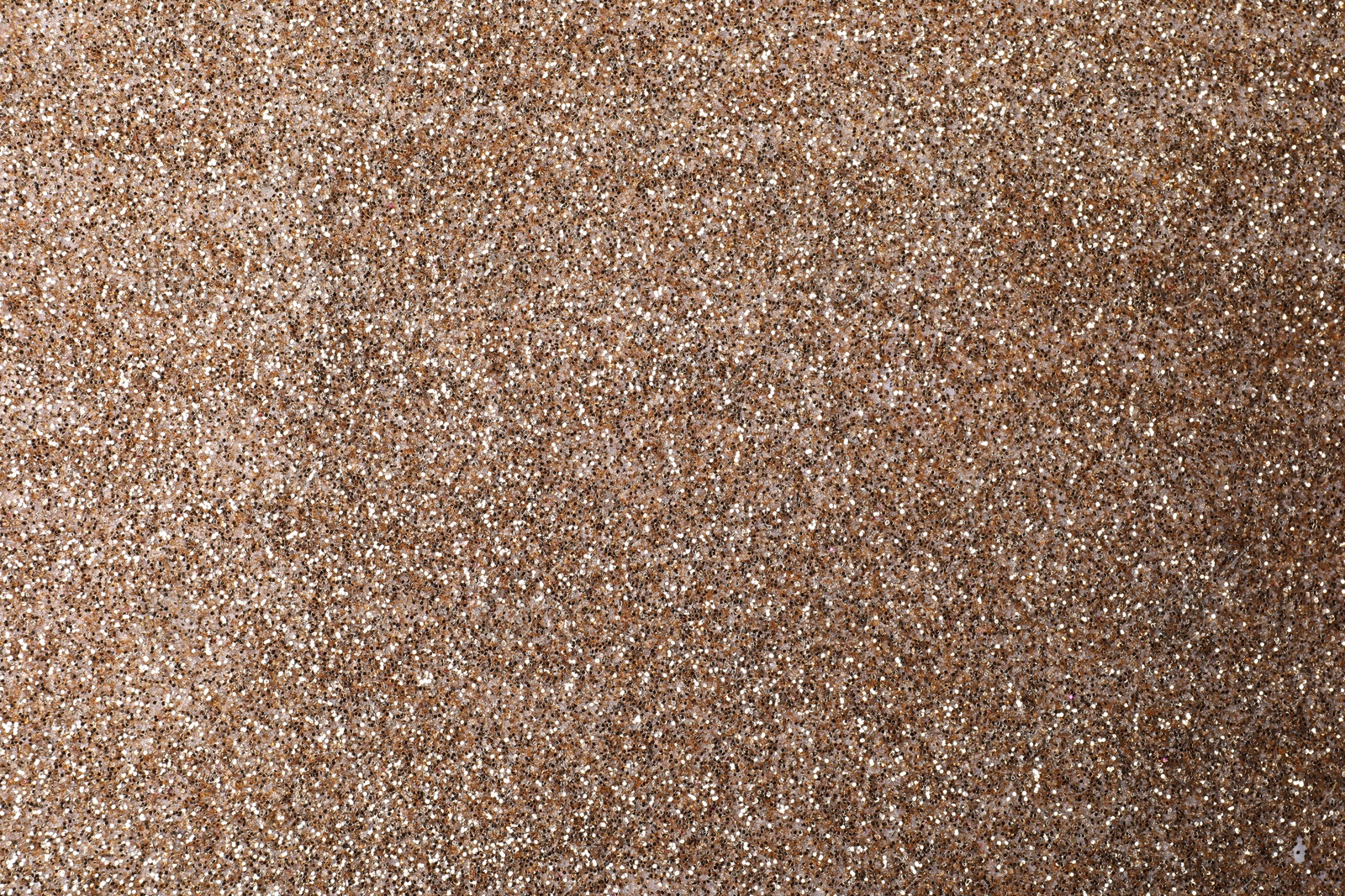 Photo of Shiny light brown glitter as background, closeup