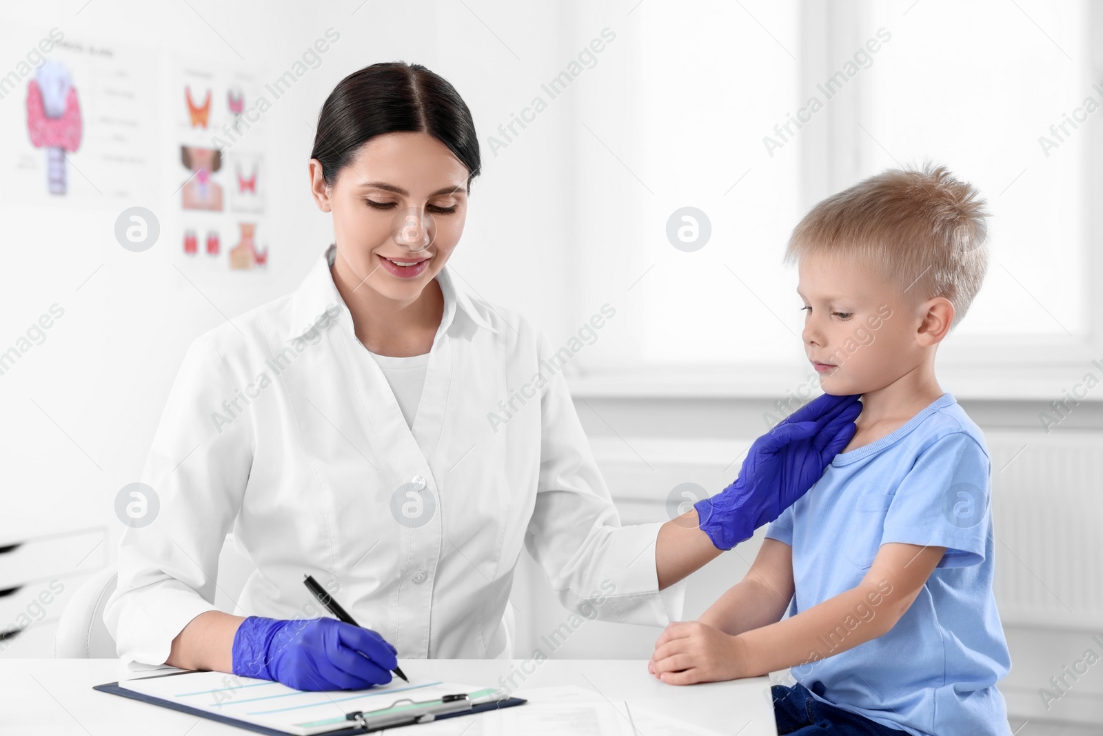 Photo of Little boy having appointment with endocrinologist at hospital