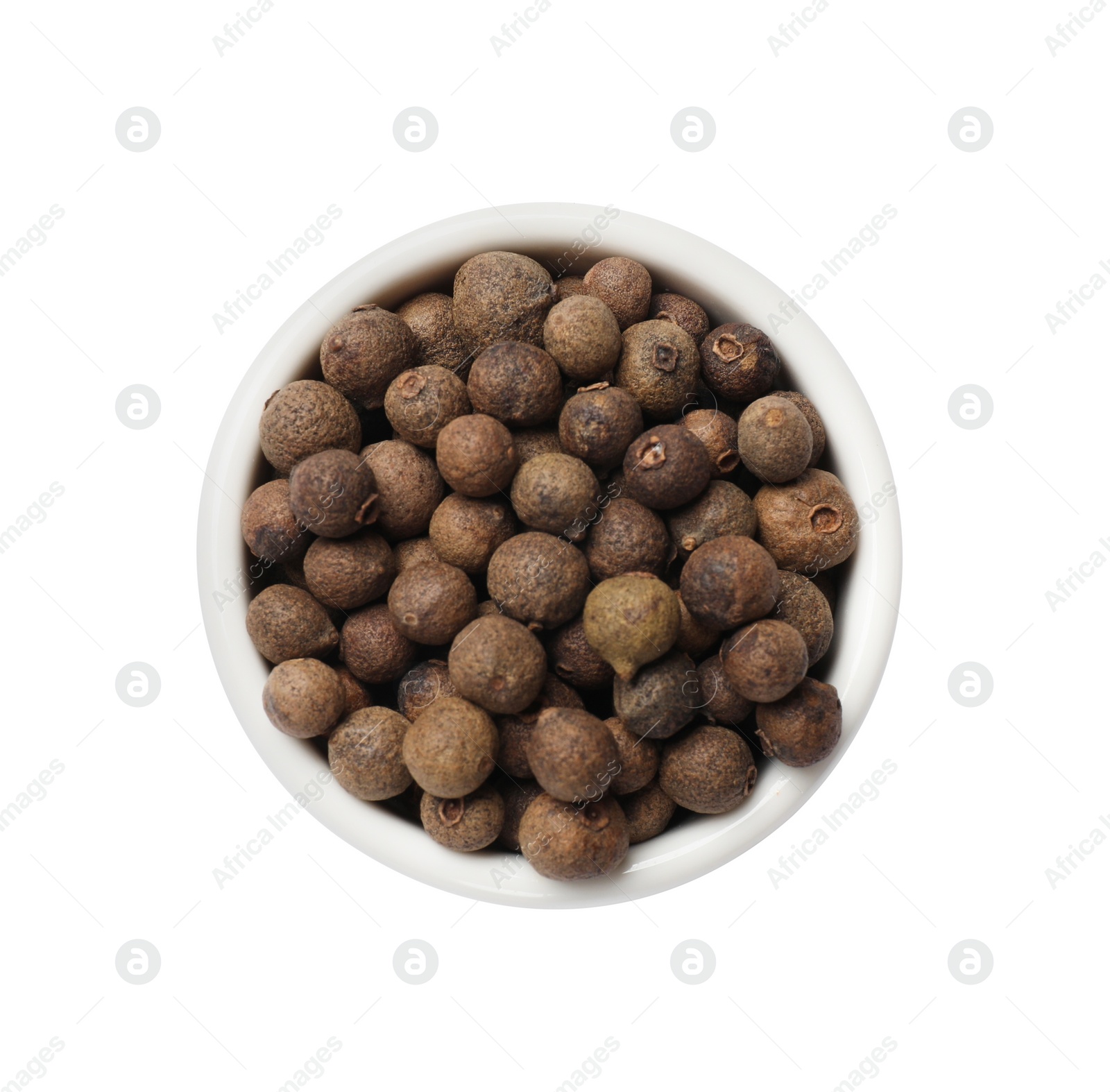 Photo of Dry allspice berries (Jamaica pepper) in bowl isolated on white, top view