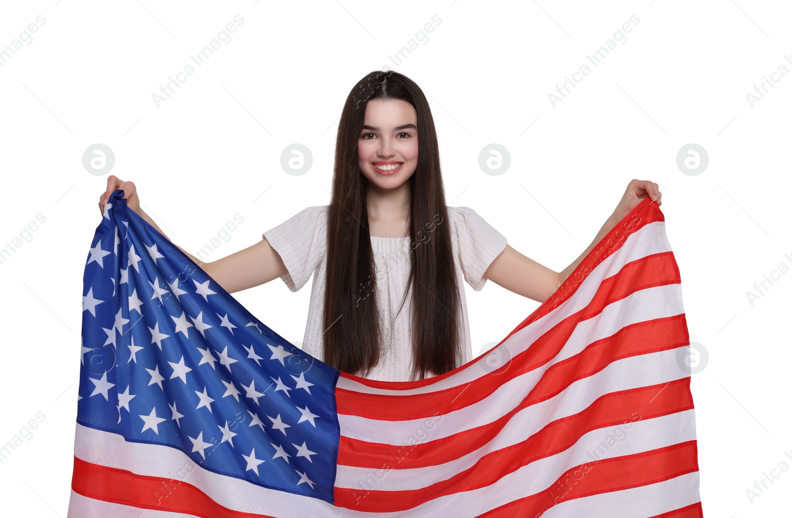 Image of 4th of July - Independence day of America. Happy teenage girl holding national flag of United States on white background