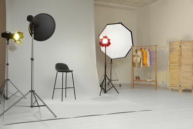 Photo of Interior of modern photo studio with professional equipment