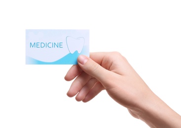 Woman holding business card isolated on white, closeup. Dental medical service